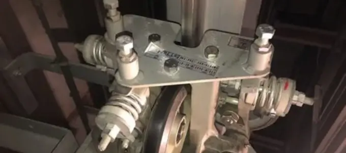 placement of elevator sliding guide shoes